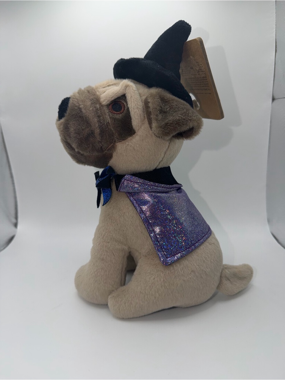 Plush Pug Dog Toy in Beige with Purple Holographic Cape and Black Witch Hat